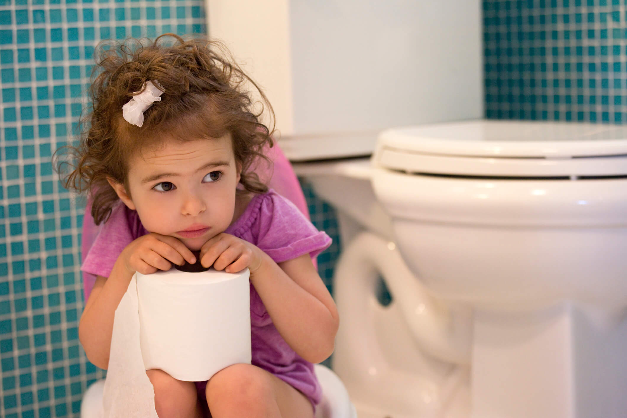 young girls on the toilet Masterfile